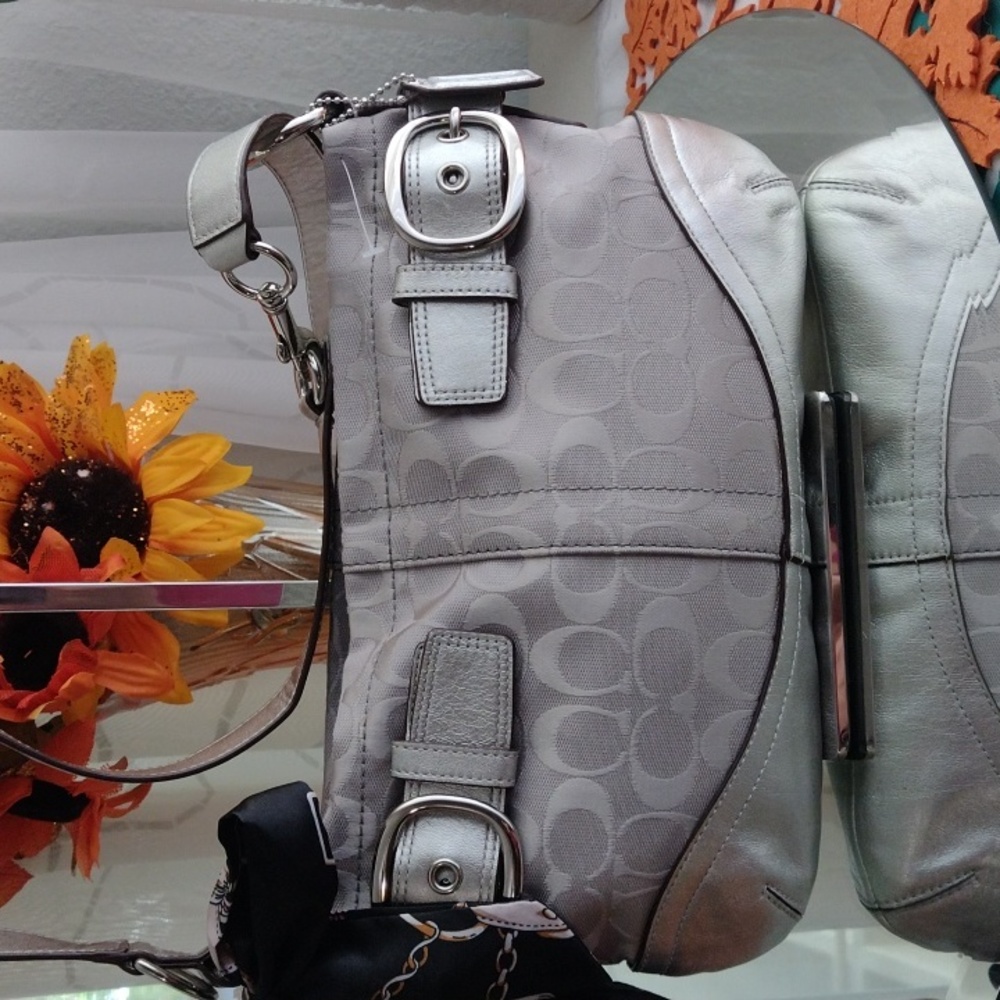 New Authentic Coach signature buckle bag.